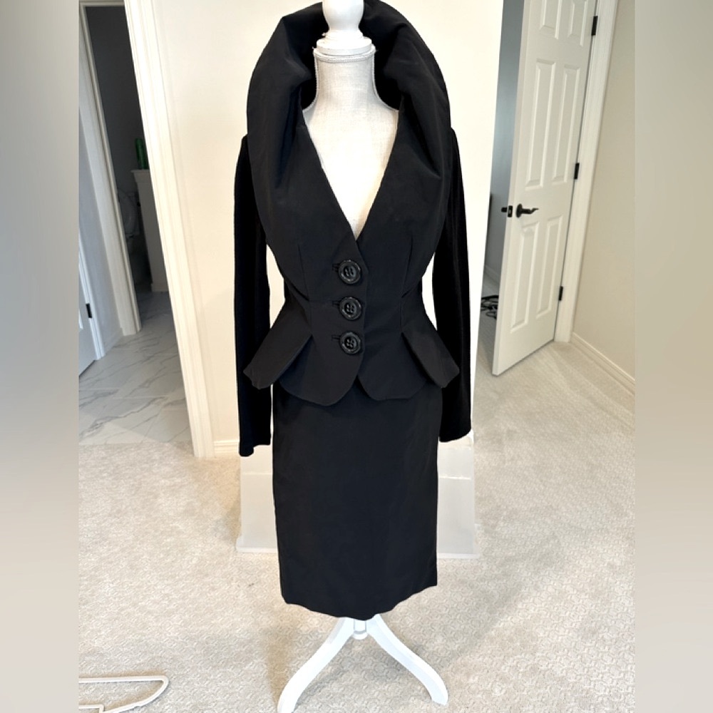 Charles Chang-Lima black suit